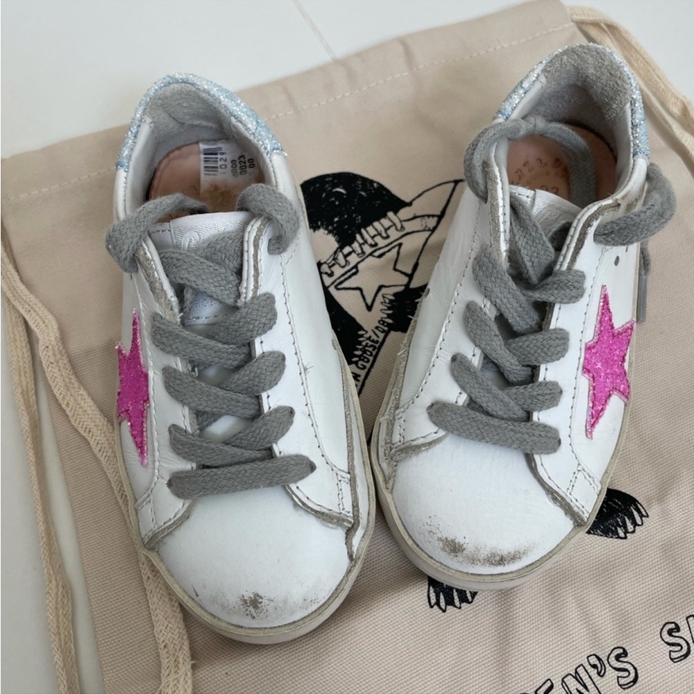 adorable sneakers for young girl only worn once sadly and she's outgrown them!